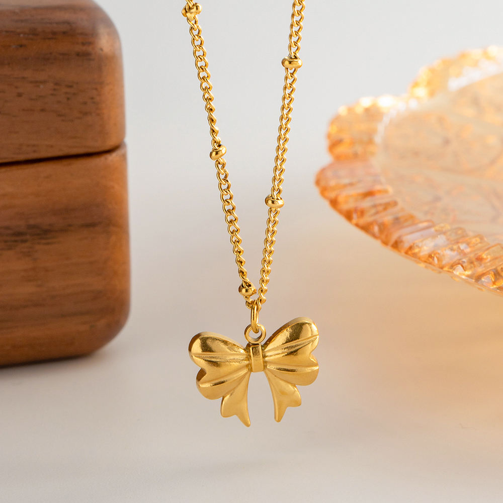 Golden Bow Charm Kette